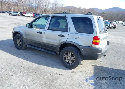 2004 Ford Escape Xlt z USA, uszkodzony, nr VIN 1FMCU03164KA96034